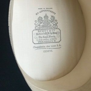 Classic tall Silk Top Hat/A gentleman's silk top hat, Scott & Co, Piccadilly, and a faille collapsible opera hat, Robert Heath