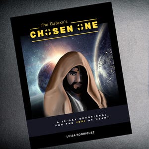May include: A book cover with a dark background and a galaxy scene. The title is "The Galaxy's Chosen One" in yellow letters. The subtitle is "A 12-Day Devotional for the Jedi at Heart" in white letters. The author's name is "Luisa Rodriguez" in white letters.