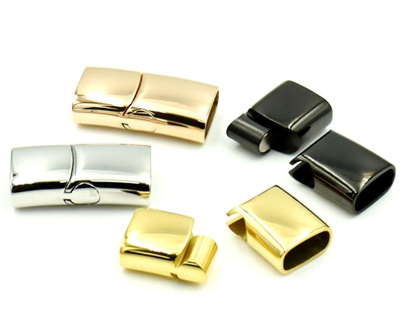 May include: Five magnetic clasps for jewelry making in different finishes: gold, rose gold, silver, and black.