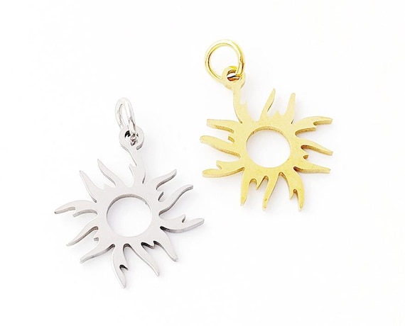 Beadwork Finding - Circle w/Sun, 16x21mm per pair Beadwork Finding - Circle w/Sun, 16x21mm per pair