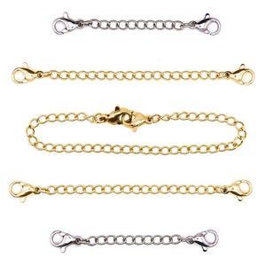 Puede incluir: Cinco extensores de cadena diferentes para collares o pulseras. Los extensores están hechos de metal plateado y dorado y tienen un cierre de langosta.