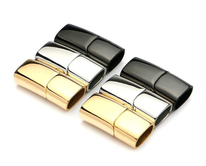 May include: Three pairs of magnetic clasps for jewelry making. The clasps are made of metal and come in gold, silver, and black.