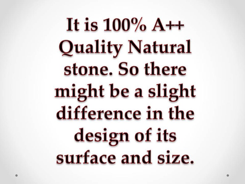 May include: Text on a white background that reads: "It is 100% A++ Quality Natural stone. So there might be a slight difference in the design of its surface and size."