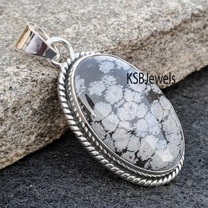 Colgante ovalado de obsidiana con copo de nieve: joyería de piedras preciosas en plata de ley