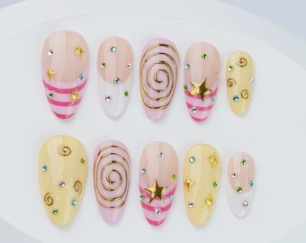 Unghie finte a righe francesi, stelle cromate dorate, set acrilico con glitter marroni