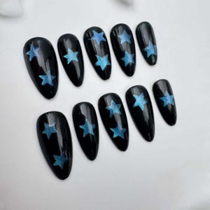 Handmade Black Almond Press On Nails: Blue Star Flakes