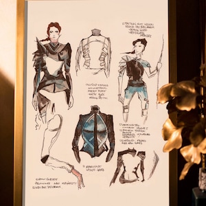 Réplica de un objeto inspirado en una película: boceto de diseño de Cinna para la chaqueta de protección de hombro de Katniss Everdeen de las películas de Los juegos del hambre