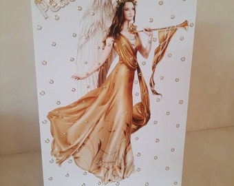 May include: A white card with a gold angel illustration and the word "Peace" in gold glitter. The background is decorated with small silver dots.