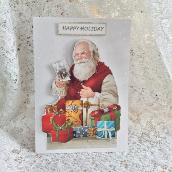 Biglietto di auguri natalizio di Natale: Spinta della slitta di Babbo Natale - Download digitale - Italia