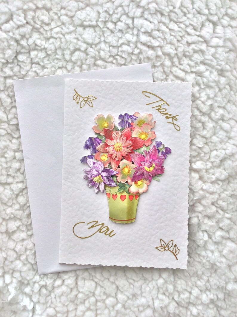 This simple thank you card will show how much you care with its beautiful basket of flowers