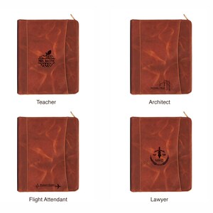 May include: Four brown leather journals with gold zippers. Each journal is embossed with a profession and name: Teacher, Architect, Flight Attendant, and Lawyer. The Teacher journal has an apple graphic, the Architect journal has a bridge graphic, the Flight Attendant journal has an airplane graphic, and the Lawyer journal has a scales graphic.