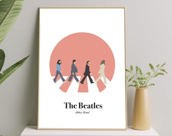 May include: A minimalist poster with a pink circle and a black and white illustration of the Beatles walking across a crosswalk. The text "The Beatles" and "Abbey Road" is printed below the illustration.
