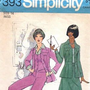 May include: A Simplicity sewing pattern envelope 7393 for a size 14 miss. The illustration shows two outfits: a purple jacket, vest, and pants set, and a green jacket and skirt set. The text includes 7393, Simplicity, size 14, and miss.