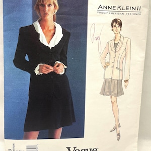May include: Vogue sewing pattern for a black blazer and skirt by Anne Klein II. The pattern is for sizes 8-10-12.