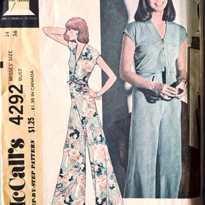 May include: Vintage McCall's sewing pattern 4292 for misses' top and pants. The pattern features a jumpsuit design with a floral print and a solid-colored jumpsuit. The pattern is marked "easy to sew".
