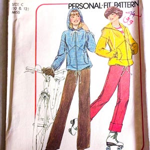 May include: Vintage Simplicity sewing pattern 7715, with illustrations of a hooded jacket and trousers outfit. The pattern includes sizes C (10 & 12) and is a personal-fit pattern. The price is £1.40 in Canada.