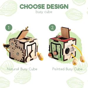 May include: Two wooden busy cubes, one natural wood and one painted with a colorful design. The natural cube has a gear mechanism and a sliding door. The painted cube has a maze, a switch, and a pull string. Both cubes have a number and the text "Choose Design" and "busy cube" above them.