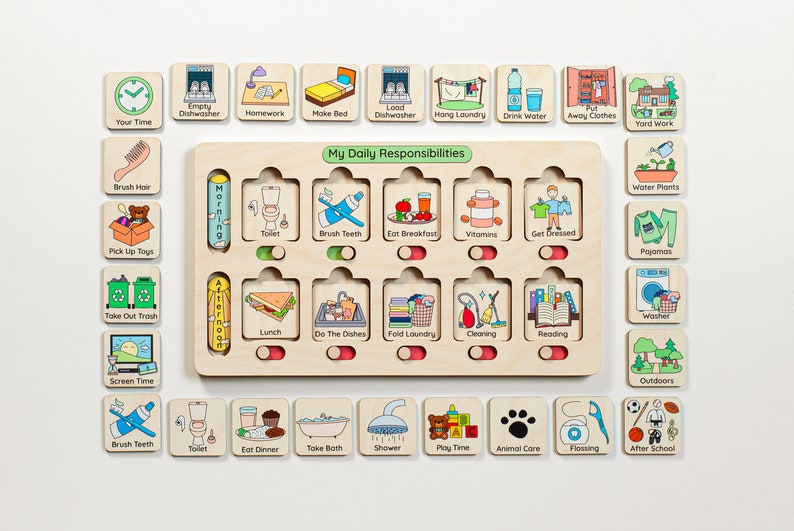May include: A wooden board with a cutout for cards, labeled "My Daily Responsibilities".  The board has two columns, one for "Morning" and one for "Afternoon".  Each column has slots for cards with images and text representing daily tasks, such as "Brush Teeth", "Eat Breakfast", "Do the Dishes", and "Fold Laundry".  There are also separate cards with images and text for other tasks, such as "Water Plants", "Pajamas", and "Screen Time".
