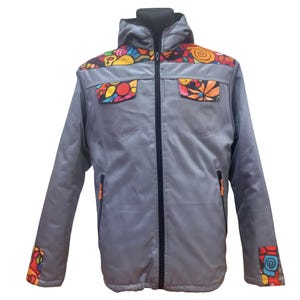 May include: A gray zippered jacket with a colorful floral pattern on the hood, pockets, and cuffs. The jacket has a black zipper and orange zipper pulls.