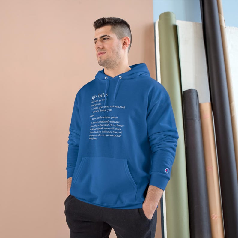 May include: A royal blue hooded sweatshirt with the word "go bills" defined as "a love, endearment, peace, a place commonly used as a greeting or farewell.  Has a deeper meaning, signifies a welcoming, warm invitation, defines a love of country with the environment and neighbors."