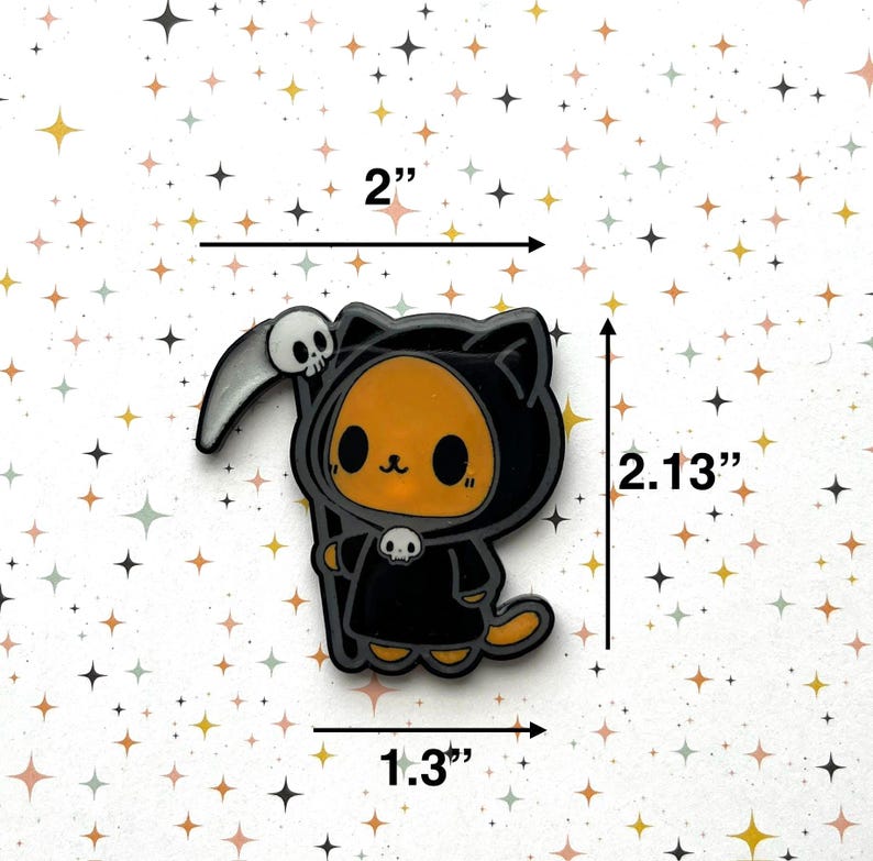 May include: A cartoon-style cat dressed as the Grim Reaper, holding a scythe with a skull. The cat is orange with black accents and a black hooded robe. The charm measures 2 inches wide, 2.13 inches tall, and 1.3 inches thick.