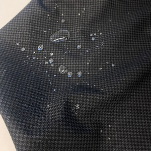 Loro Piana Storm System Merino Wool Grey/Black Houndstooth fabric shower proofed