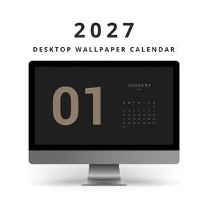 May include: A computer monitor displaying a 2027 desktop wallpaper calendar. The screen features a dark gray background with the large beige number 01, the text JANUARY 2027, and a monthly calendar grid. The monitor has a silver stand and frame.