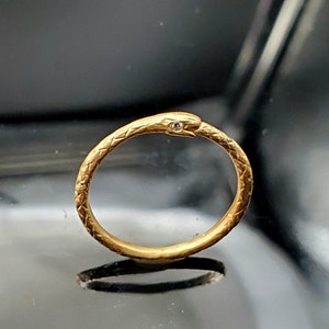 Adorable 14K Gold Thin Snake Band with Diamond Eyes
