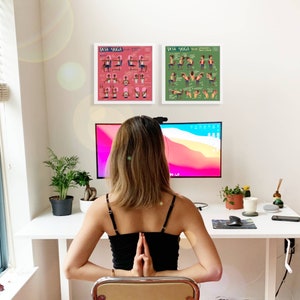 lady in front of desk stretching when looking at desk yoga posters