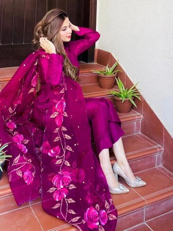 raw silk dresses with organza dupatta        '26 A refreshing  green raw silk straight-cut kurta paired with elegant raw silk plazzo and a  delicate organza dupatta. Graceful, festive, and effortlessly chic 