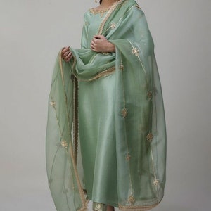 Silk straight kameez, straight brocade pant, lace border orgenza dupatta