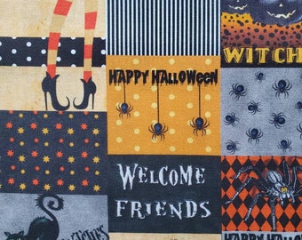 May include: A patchwork fabric with a Halloween theme. It features black cats, witches, spiders, pumpkins, and the text "Happy Halloween", "Welcome Friends", and "Witches Welcome".