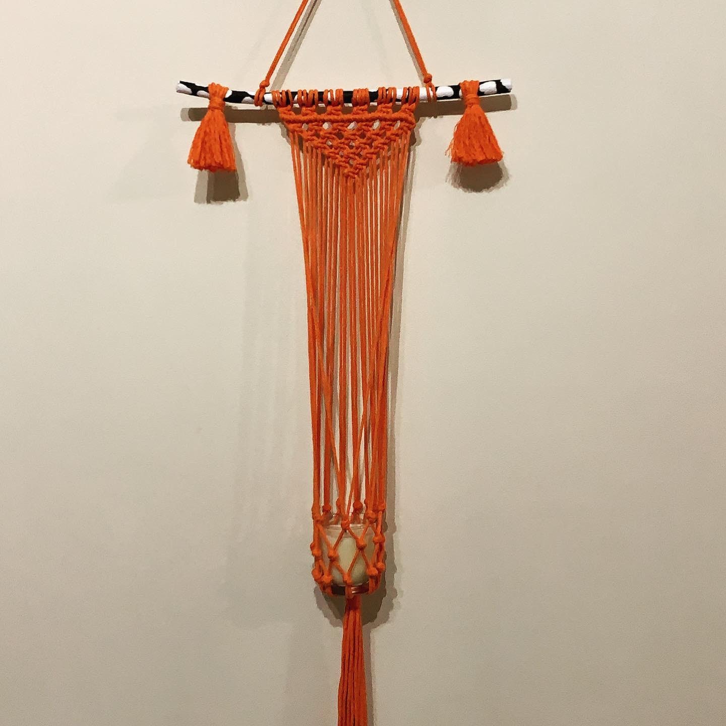 Macrame wall hanging plant hanger cow print dowel orange cord Etsy