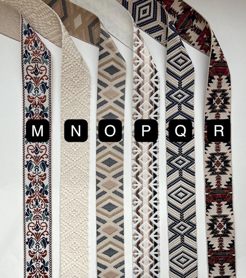 May include: Six different patterned fabric trims in various colors, including beige, brown, gray, white, blue, and red. The trims are labeled with the letters M, N, O, P, Q, and R.