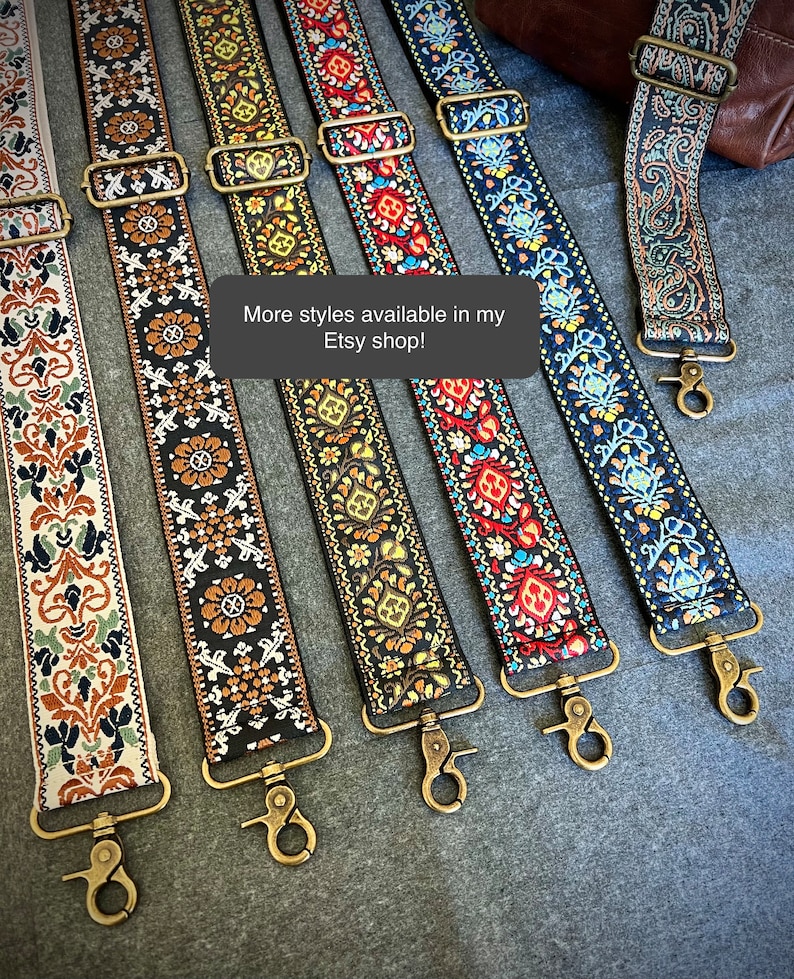 May include: Six adjustable bag straps featuring various woven patterns in colours including cream, black, red, blue, and gold. Each strap includes antique brass-toned metal hardware, sliders, and swivel lobster clasps. Text reads: More styles available in my Etsy shop!