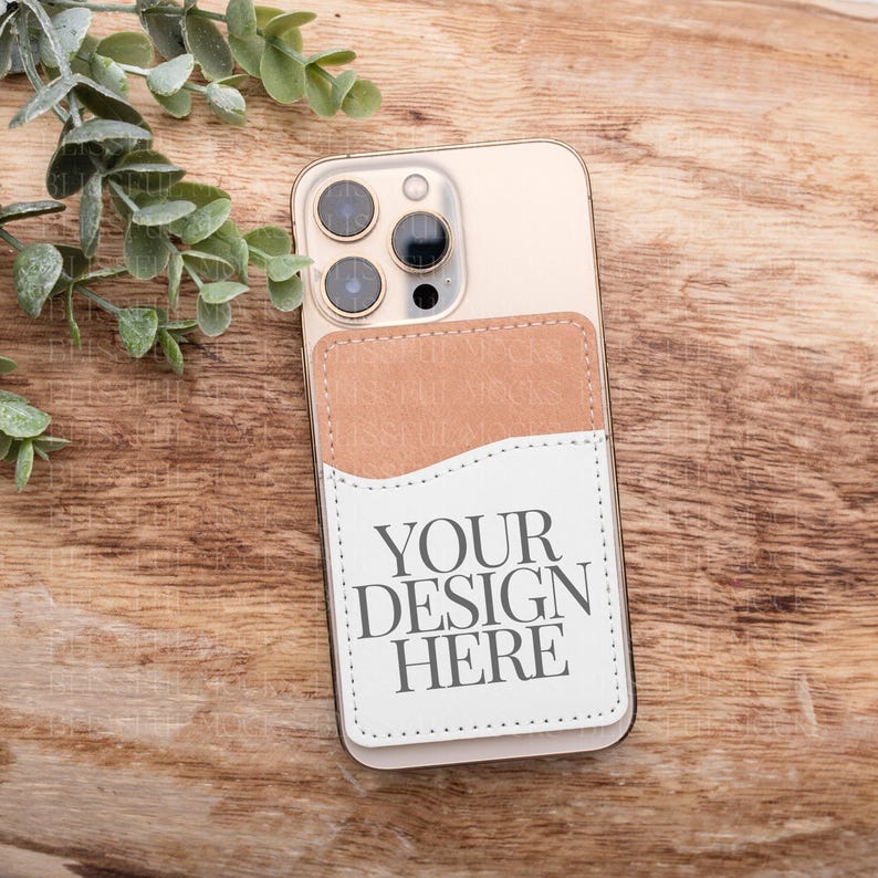 May include: A white phone case with a brown leather pocket on the back. The case has a camera lens cutout and the text "YOUR DESIGN HERE" printed on the pocket.