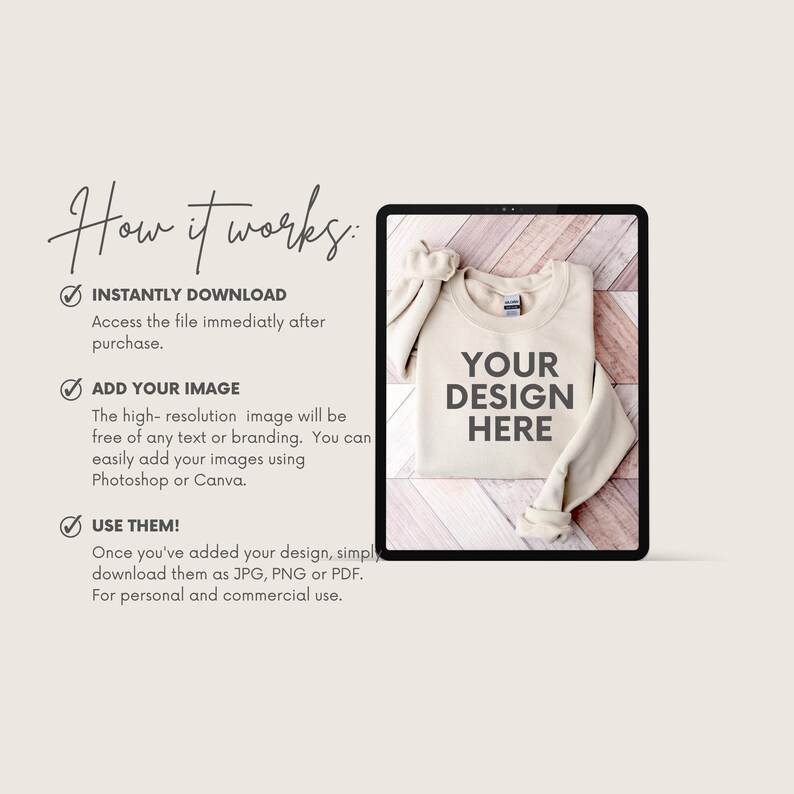 May include: A digital mockup of a beige sweatshirt on a wooden background. The sweatshirt has the text "YOUR DESIGN HERE" printed on the front.