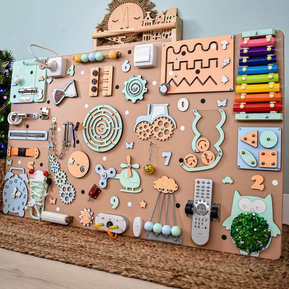 CATOR Tablero Sensorial De Doble Cara – Juguete Anti Estrés Con 16 Accesorios Para Autismo Y TDAH