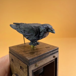 Bobbin Crow Automaton. Oil painted mechanical bird, kinetic hand carved sculpture.