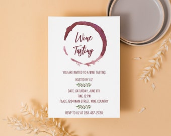 May include: A white invitation card with a red wine stain graphic and the text "Wine Tasting". The invitation details a wine tasting hosted by Liz on Saturday, 11th June at 12 PM at 1284 Main Street, Wine Country. The RSVP information is included at the bottom of the card.