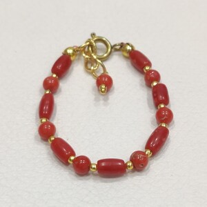 Chinese coral bracelet for baby meaning hotsell