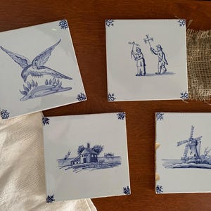 Set of 4 Antique Hand-Painted Delft Tiles – Authentic Dutch Ceramic Art