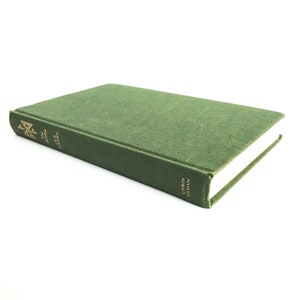 K&ouml;nnte beinhalten: Ein gr&uuml;nes Hardcover-Buch mit goldenen Lettern auf dem R&uuml;cken. Der Titel des Buches lautet "The Collected Poems of Dylan Thomas".