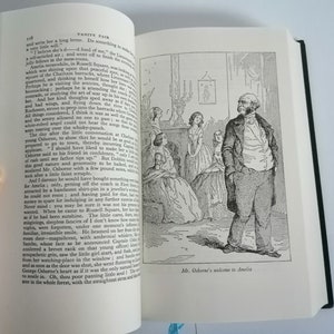 May include: A black and white illustration of a man standing in a room with a group of women. The man is wearing a suit and has a beard. The women are wearing dresses. The caption below the image reads "Mr. Osborne's welcome to Amelia."