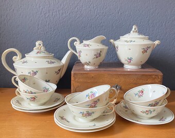 Porcelain tea set decorated with flowers. Royal Manufacture of Limoges