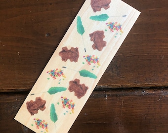 Zauberhaftes Bonbon-Lesezeichen aus Holz (Frösche aus Schokolade, Stacheln & Bohnen)