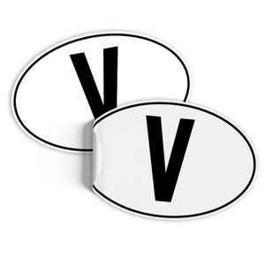 May include: Two white oval stickers with a black letter V printed on each.