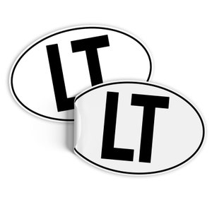 May include: Two white oval stickers with black borders and the letters "LT" in black.