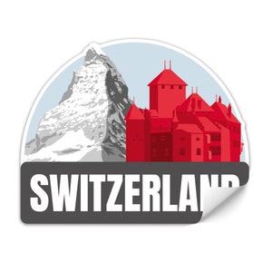 May include: A red and white sticker with a stylized image of a mountain and a castle. The sticker says "SWITZERLAND" in white letters on a gray background.