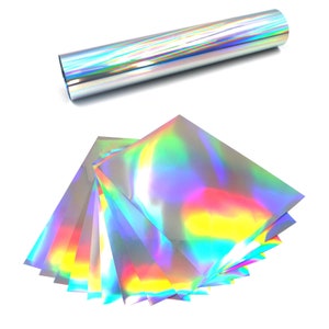 May include: A roll of iridescent holographic vinyl film, unrolled to show the rainbow colours and texture. The film is also shown in a stack of sheets.